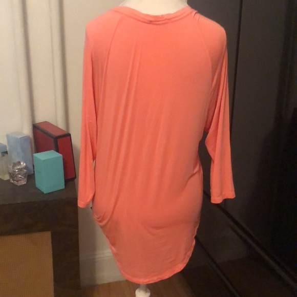 Pink Victoria’s Secret orange top that tied in the center…” pink” is in black - Picture 3 of 3